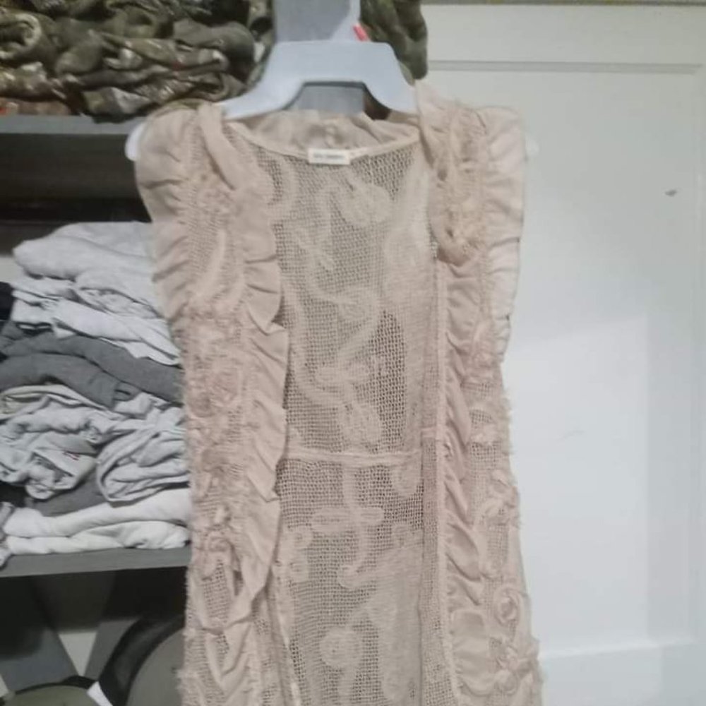 Women pull over cardigan